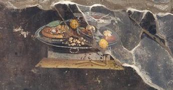 Su un muro di Pompei scoperta l’antenata della pizza