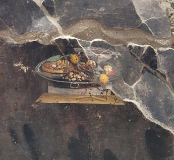 Su un muro di Pompei scoperta l’antenata della pizza