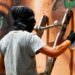 Jorit e il selfie con Putin: dal murales di Mariupol a Sochi, chi è lo street artist