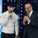 Tony Effe assente ai Tim Summer Hits, Carlo Conti spiega: “È incinto”
