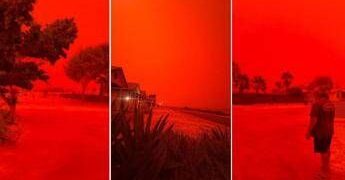 Cielo apocalittico in Australia, il ciclone Narelle tinge tutto rosso sangue: le immagini sono virali